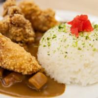 Curry Fried Chicken Over Rice · Japanese-style fried chicken, carrots, onion, potato in rich curry sauce over Rice.