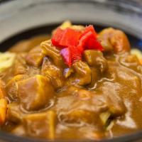 Curry Chicken Over Noodle · Tender chicken, carrots, onion, potato in rich curry sauce over Noodle.