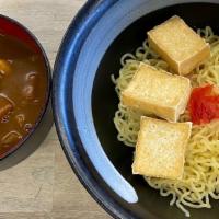 Vegetarian Curry Over Noodle · Tofu, carrots, onion, potato in rich curry sauce over Noodle.