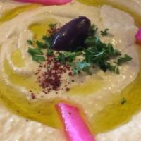 34. Hummus House Signature Dish (Vegetarian) · Check Peas with Tahini Sauce, Sesame Seed Paste, Garlic, Parsley & Topped with Olive Oil
