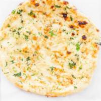 45. Garlic Naan · Naan baked in tandoor with topping of garlic and cilantro.