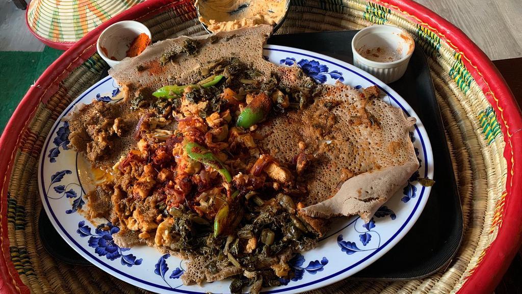 Doro Tibs · Spicy. Chicken. Tender pieces of chicken sautéed in a rich mixture of garlic, ginger, onion, bell peppers and traditional Ethiopian spices.