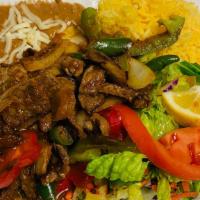 Steak Ranchero · Chopped steak cooked in bell pepper, onions in a tomato sauce.