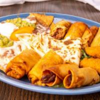 Appetizer Sampler · An assortment of Chicken Taquitos, Nachos, Quesadillas, Chicken Mini Chimis, Jalapeno Popper...
