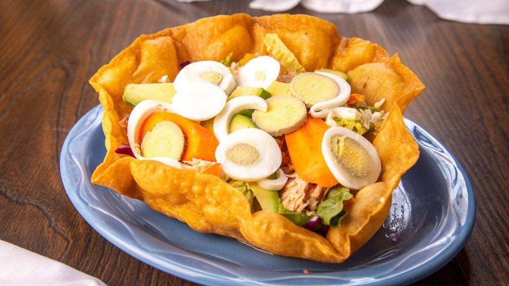Fresh Cielito Salad · Crisp green Lettuce, Avocado, Tomatoes & Cheese Served in a Large Crispy Tortilla Bowl 
Shredded Chicken topped with hard boiled Eggs