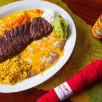 Carne Asada Ls · If you love steak, this is a prime choice. Steak cooked to your liking, accompanied by a che...