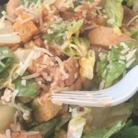 Caesar Chicken Salad · Fresh romaine lettuce mixed with grilled chicken, grated Parmesan cheese, light garlic crout...