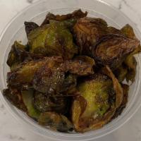 Brussel Sprouts · Fried crispy w/ sea salt, pepper, & a drizzle of maple syrup.