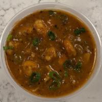 Side of Seafood Gumbo · A seafood stew with gulf shrimp, pacific cod, and rock crab. Served with a mound of white ri...