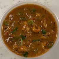 Side of Crawfish Etouffee · Louisiana crawfish tails smothered in a rich sauce topped with white rice and garnished with...
