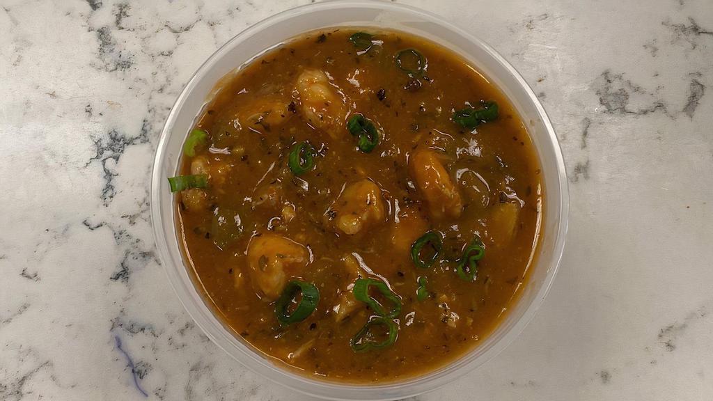 Seafood Gumbo · A seafood stew with gulf shrimp, pacific cod, and rock crab. Served with a mound of white rice, french bread and sprinkle of green onions.