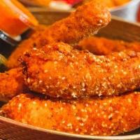 5 Tenders and 3 Sauces · Your choice of breading: crispy or crunchy, or even better mix & match. 
Crunchy has almonds...