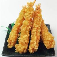 Shrimp Tempura · Fried tempura battered shrimp. Comes with tempura sauce. 4 pieces.