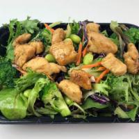 Grilled Chicken Salad · Grilled halal chicken breast, organic green mix salad, broccoli, shredded carrots, purple ca...