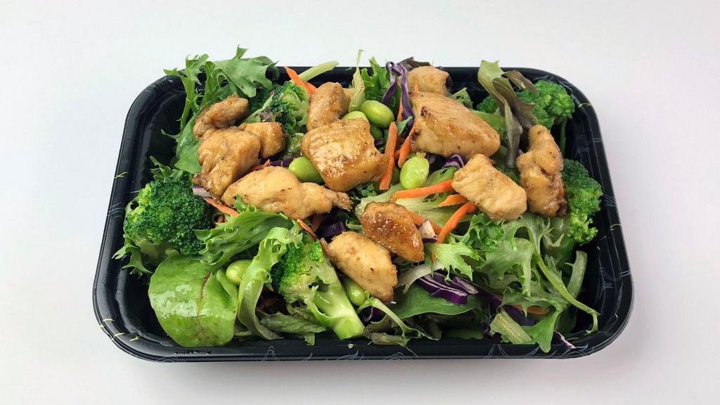 Grilled Chicken Salad · Grilled halal chicken breast, organic green mix salad, broccoli, shredded carrots, purple cabbage. Comes with sesame dressing.
