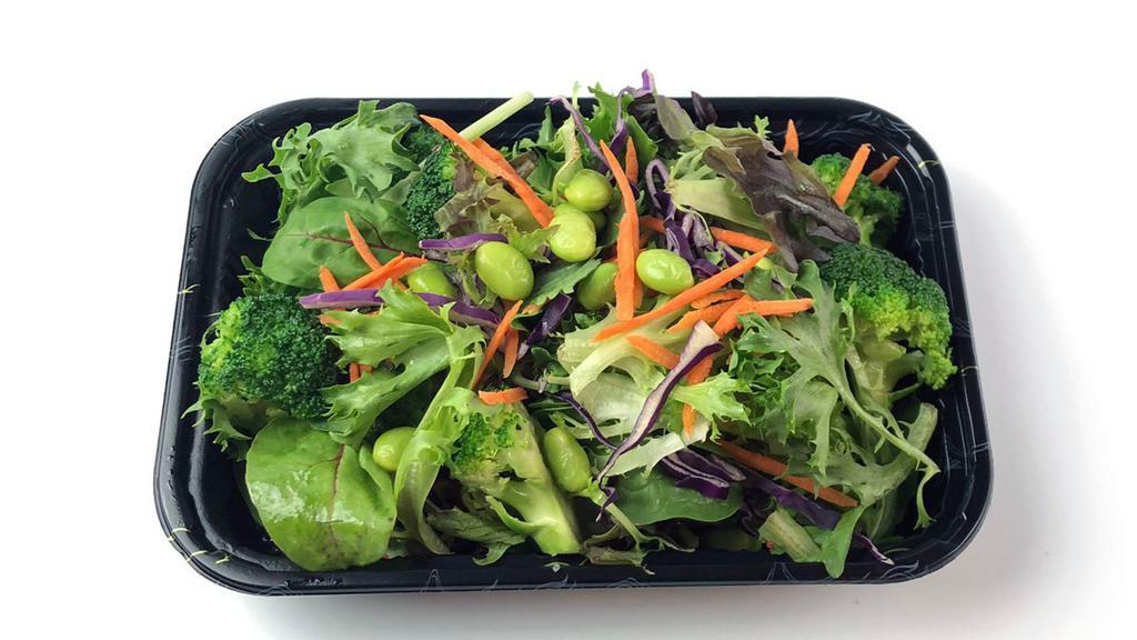 House Salad · Organic mixed salad, broccoli, shredded carrots, purple cabbage. Comes with sesame dressing. (v)