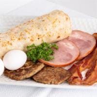 Breakfast Burrito · Serve with two  eggs scramble,choice of meats(Bacon, Ham, Sausage), Home fries potatoes, jac...