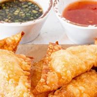 Shrimp Wontons · (6) - served with a soy vinegar sauce and sweet chili sauce