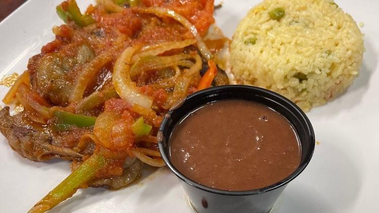 Bistec Salvadoreño · Salvadoran Steak served w/rice, refried beans & salad