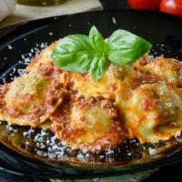 Ravioli Meat Sauce · Meat-filled ravioli in our homemade sauce.