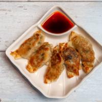Gyoza (5) · Five pieces freshly made pan-fried pork dumplings. Voted best in the silicon valley.