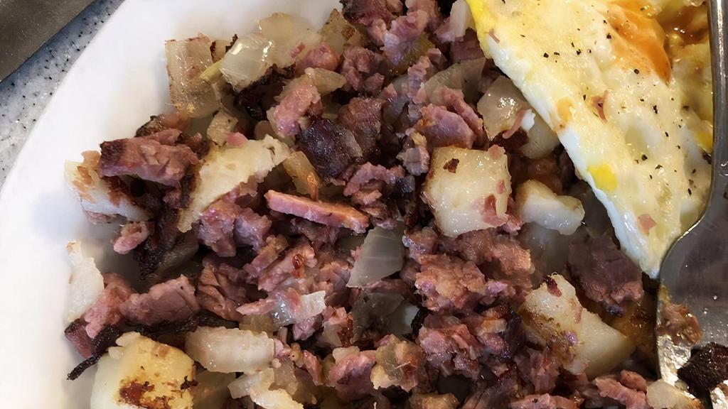 Corned Beef Hash · Two eggs and toast.
