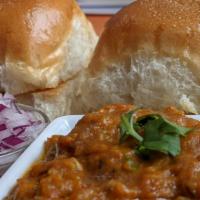 Pav Bhaji · Pav Bhaji is  medley of spicy mashed veggies topped with lots of butter (Amul butter),  cila...