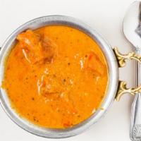 Chicken Tikka Masala · Clay oven roasted chicken cooked in mildly spiced sauce.