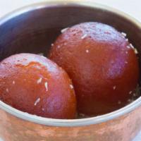 Gulab Jamun · Pastry balls made with milk & deep fried in sugar syrup.