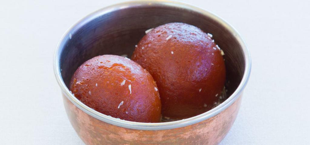 Gulab Jamun · Pastry balls made with milk & deep fried in sugar syrup.