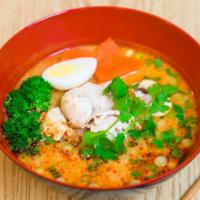 Tom Yum Noodle Soup · Hot and sour noodle soup with rice noodle, egg, broccoli, carrot, cilantro and choice of chi...