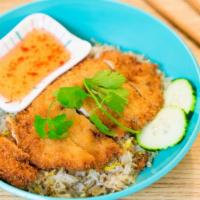Fried Chicken Over Fried Rice · Egg fried rice top with deep fried marinated chicken come with sweet & sour sauce.