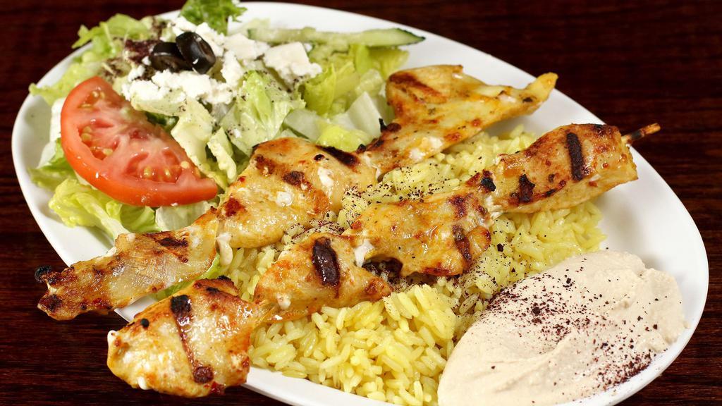 Kebab Plate (Regular) · Two charbroiled skewers served on a bed of seasoned rice, hummus and Greek salad. Tri-tip, kefta or chicken. Lamb with extra cost. Combo: choose any 3 skewers (tri-tip, kefta, chicken) with extra cost.