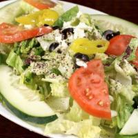 Greek Salad · Romaine lettuce, tomatoes, cucumbers, feta cheese, kalamata olives, pepperoncini, onions and...