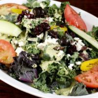 Kale Salad · Tomatoes, feta cheese, kalamata olives, cranberries and cucumber mint dressing.