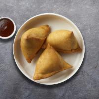 Seemingly Samosa · Idaho potatoes mixed in a curry marinate & fried in a crispy wheat layer. Served with tamari...