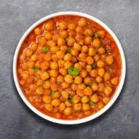 Chana Masala Chaser · Chickpeas cooked in a tomato and onion gravy with Indian spices.