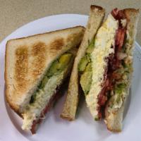 BAE Sandwich · Bacon, avocado, and egg salad toasted on sliced white bread with lettuce, tomato, and mayonn...