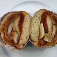 Chicken Parmesan Sandwich · Breaded chicken topped with homemade marinara sauce and melted provolone cheese toasted on a...