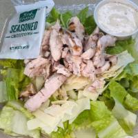 Caesar salad · Romaine, Parmesan cheese, Croutons & Caesar dressing. Add more items at an upcharge.