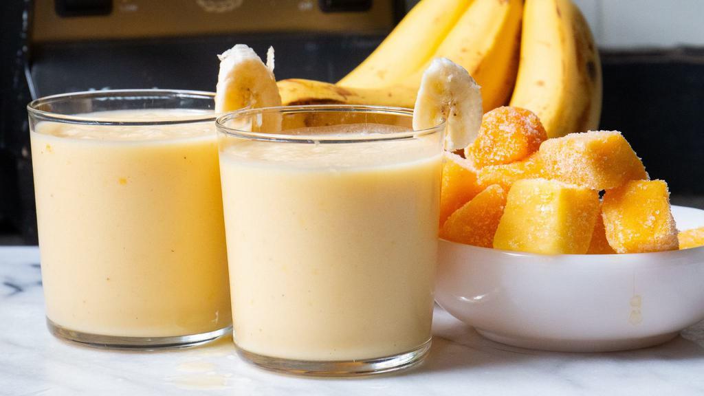 Pineapple Mango Banana Smoothie  · Frozen fresh pineapple & mango, banana & soy milk