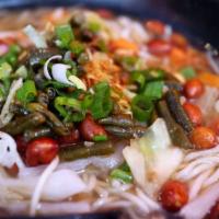 Guilin Rice Noodle Soup · Served with beef, peanut and quail eggs.