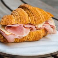 Ham and cheese croissant · Acme plain butter croissant filled withb prosciutto cotto Ferrarini and Fontina cheese