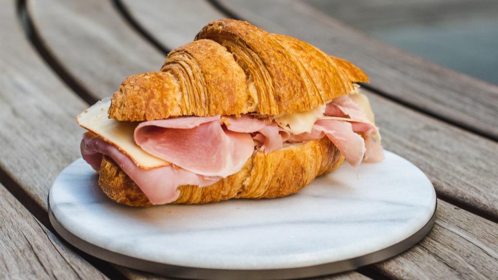 Ham and cheese croissant · Acme plain butter croissant filled withb prosciutto cotto Ferrarini and Fontina cheese