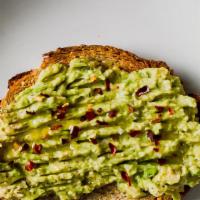 Avocado toast · Organic mashed avocado with extra virgin olive oil, salt, pepper on ACME brioche toasted bread