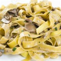 Taglierini with mushrooms · Fresh thin taglierini with porcini mushrooms, garlic and Parmigiano