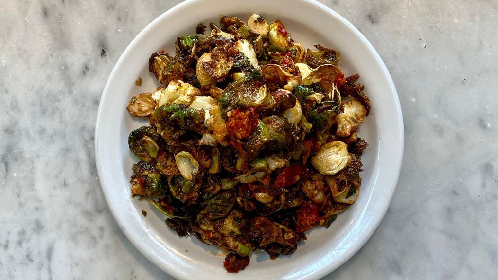 Fried Brussels Sprouts & Cauliflower · Lemon, capers, chiles, mint.
