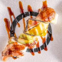 Phoenix Roll (4 Pieces) · Shrimp, cucumber top with eel, and avocado.