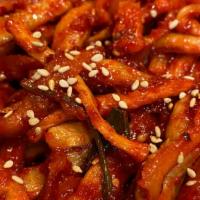 Dried Seasoned Radish (Mu-Malleng-Ee) · Home-Made!! Dried radish strips rehydrated and seasoned in spicy sauce. 8oz