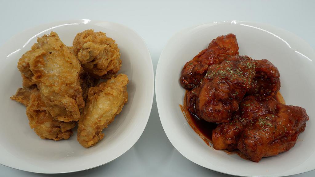 Chicken Wings (6) · Fried chicken wings. Choose spicy, soy glaze or no sauce.